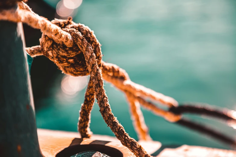 a close up of a rope on a boat, an album cover, trending on pexels, romanticism, profile image, 1 2 9 7, strength, thumbnail