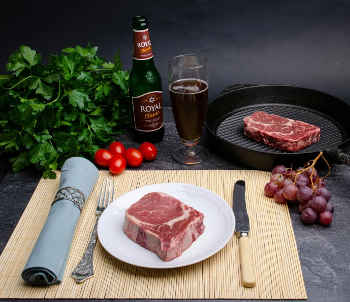 a piece of meat sitting on top of a white plate, ingredients on the table, 6 pack, royal, high quality product image”