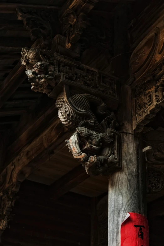 a red lantern sitting on top of a wooden pole, a statue, inspired by Itō Jakuchū, unsplash contest winner, intricate castle interior, tooth wu : : quixel megascans, wooden ceiling, intricate carved wood