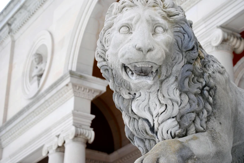 a statue of a lion in front of a building, a marble sculpture, inspired by Mirabello Cavalori, pexels contest winner, giant majestic archways, pareidolia, youtube thumbnail, profile image