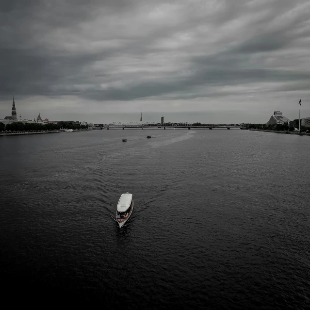 a boat in a body of water under a cloudy sky, by Tobias Stimmer, pexels contest winner, saint petersburg, dark gloomy, with a white, a small