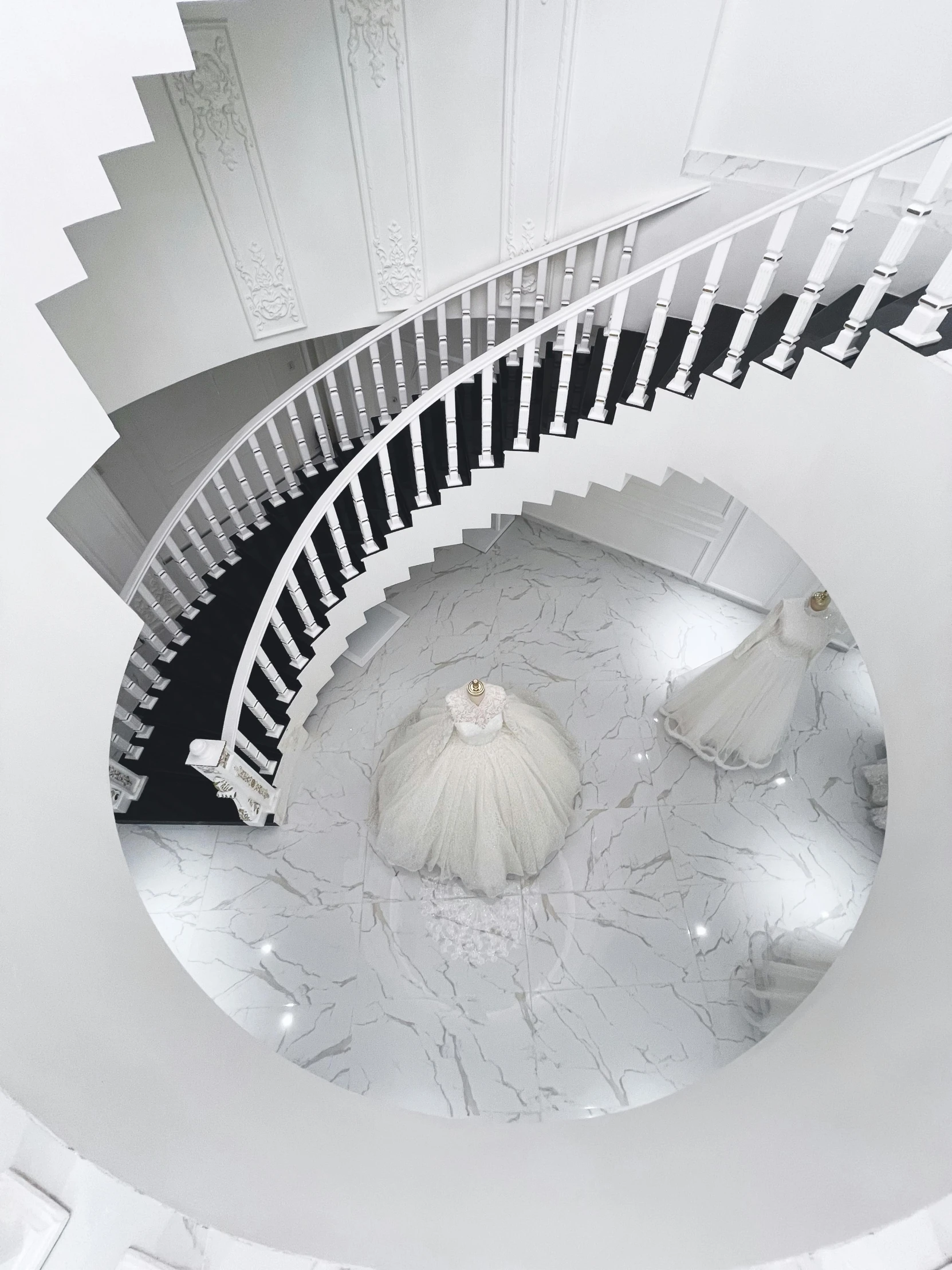 a view from the top of a spiral staircase, inspired by Anna Füssli, white regal gown, showstudio, white marble interior photograph, cai xukun