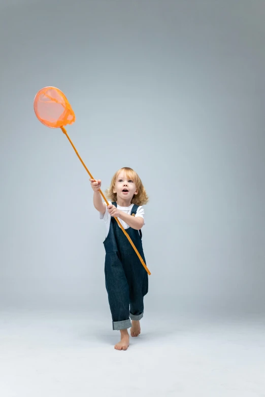 a little girl that is holding a net, by Andries Stock, plain background, 15081959 21121991 01012000 4k, flying creatures, promo image