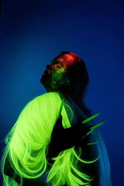 a man with neon hair holding a pair of scissors, an album cover, inspired by Elsa Bleda, zendaya as she-hulk, nick knight, slide show, spooky photo