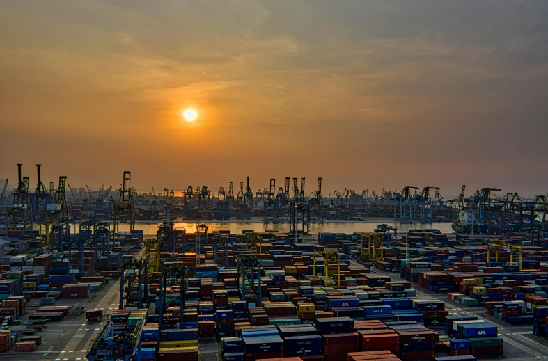 a large port filled with lots of shipping containers, pexels contest winner, renaissance, sunset panorama, thumbnail, singapore, 🦑 design