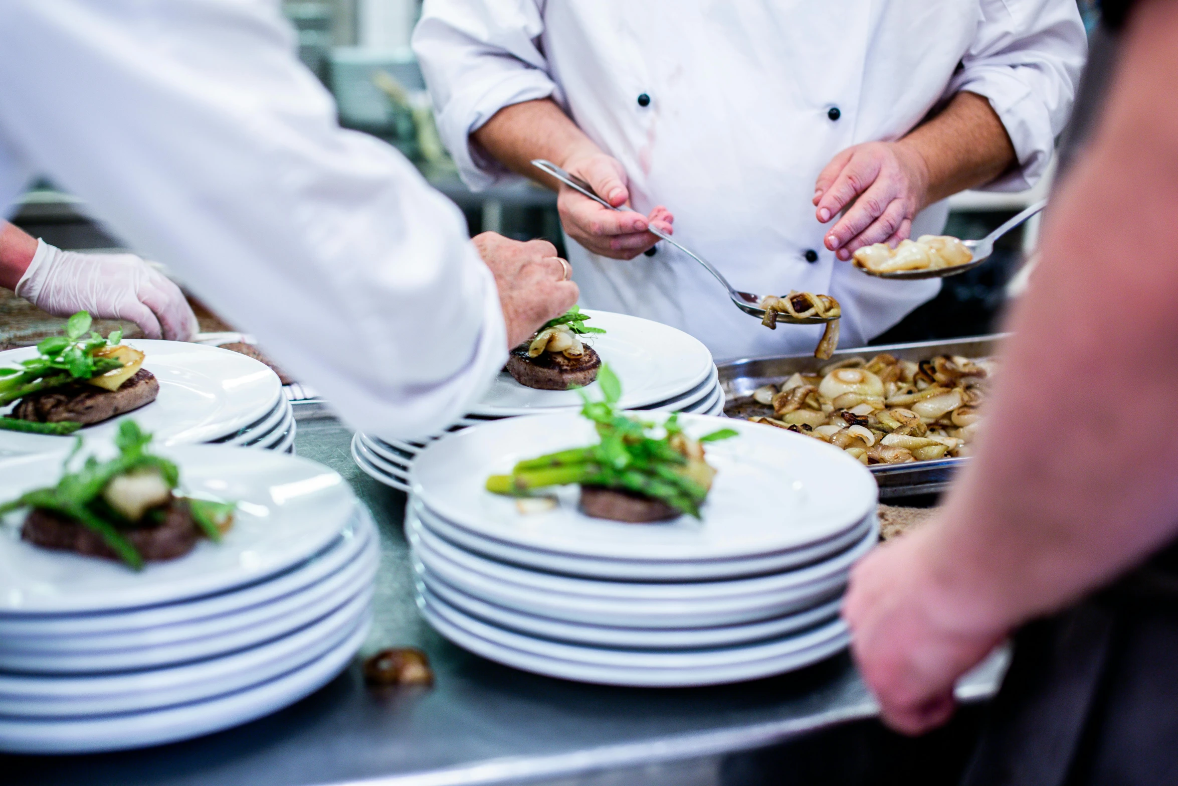 a group of chefs preparing food in a kitchen, by Lee Loughridge, pexels contest winner, plates, profile image, shiny crisp finish, thumbnail