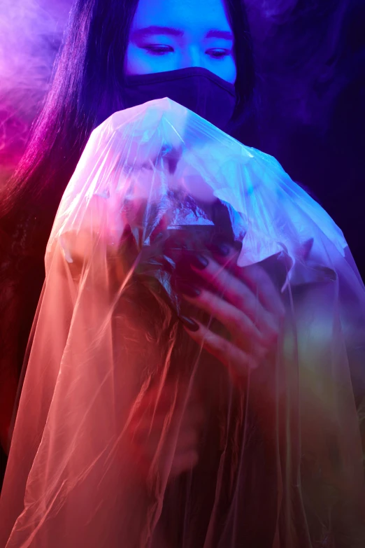 a woman with a veil covering her face, an album cover, inspired by Elsa Bleda, unsplash, conceptual art, wearing a plastic garbage bag, psychedelic lighting, covered with organic flesh, bisexual lighting