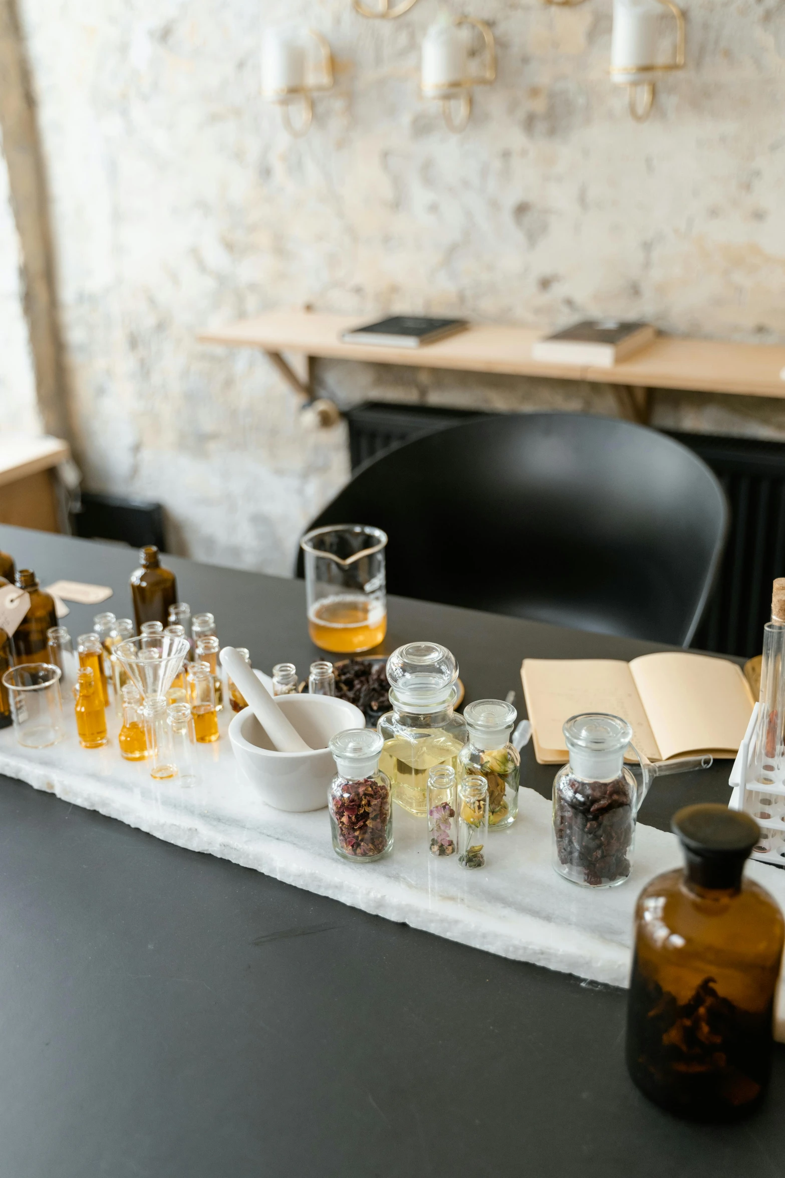 a table that has a bunch of bottles on it, a still life, trending on unsplash, molecular gastronomy, in a workshop, whisky, vanilla