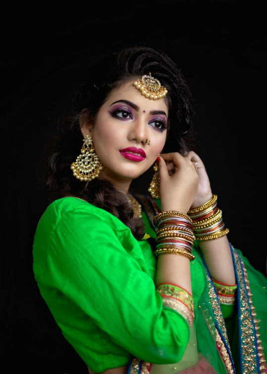 a woman in a green sari posing for a picture, inspired by Saurabh Jethani, portrait. 8 k high definition, wearing gold jewellery, square, sensuous