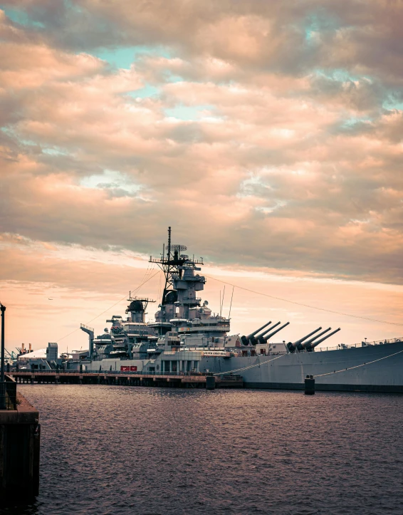 a large battleship sitting on top of a body of water, by Carey Morris, unsplash contest winner, renaissance, lgbtq, military buildings, instagram story, cleveland