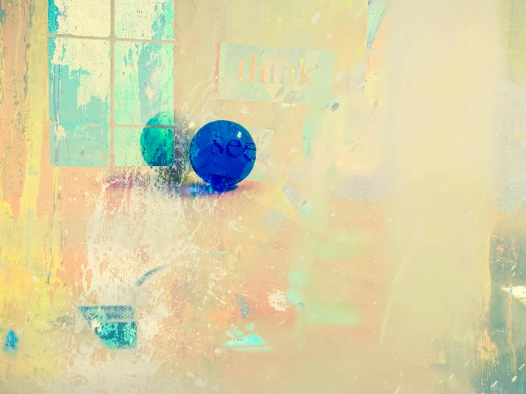 a blue ball sitting on top of a table next to a window, inspired by Richard Hamilton, lyrical abstraction, digital art - n 9, vibrant scattered light, faded colours, digital art hi