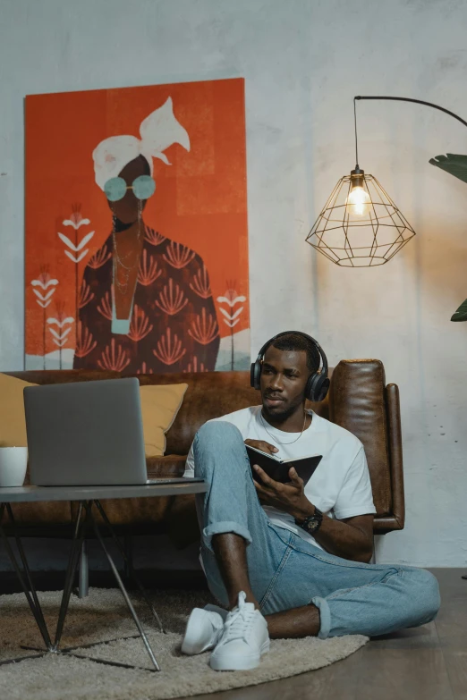 a man sitting on the floor in front of a laptop, by artist, trending on pexels, afrofuturism, headphones on his head, sitting in a lounge, faved watched read, a person standing in front of a