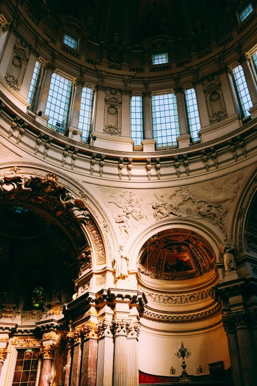 a photo of the inside of a church, unsplash contest winner, neoclassicism, inside a dome, warmly lit, berlin, baroque curls