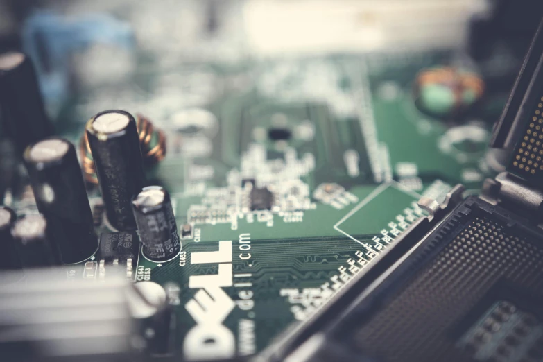 a close up of a computer mother board, a computer rendering, by Jason Felix, pexels, instagram post, a green, historical, handheld