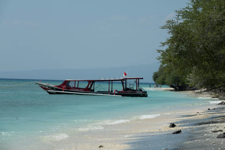 a boat sitting on top of a beach next to the ocean, hurufiyya, avatar image