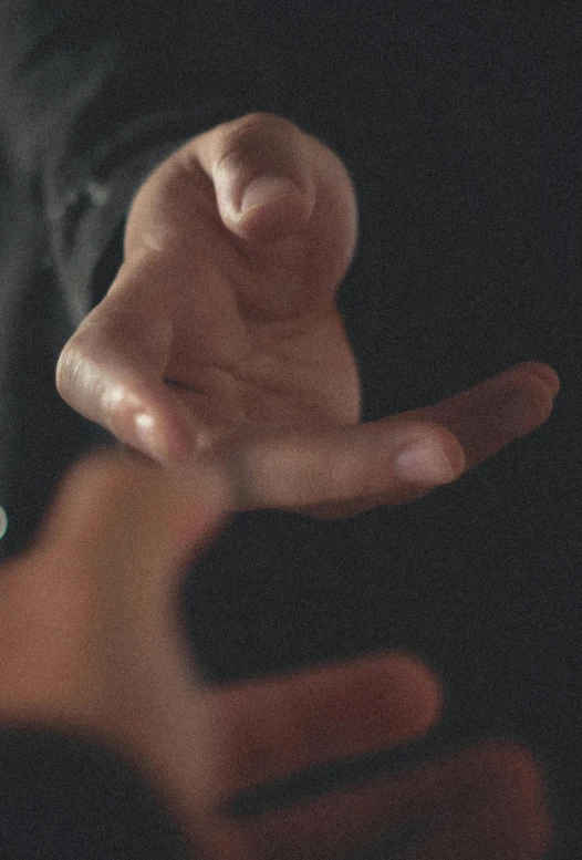 a close up of a person holding a cell phone, reaching out to each other, vfx shot, large)}], magician