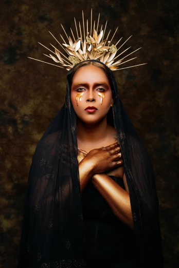 a woman with a crown on her head, an album cover, inspired by Jean-Auguste-Dominique Ingres, indigenous, holy glow, photo from a promo shoot, lgbtq