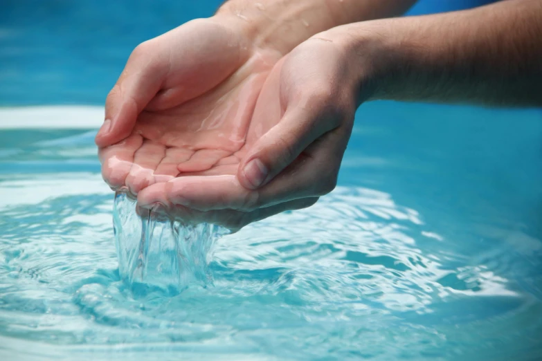 a person washing their hands in a pool, crystal clear, comforting, thumbnail, water levels