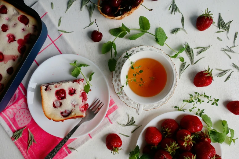 a white plate topped with a piece of cake next to a bowl of strawberries, by Emma Andijewska, trending on unsplash, tea party, cherry, 15081959 21121991 01012000 4k, flat lay