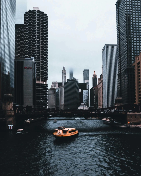 a boat traveling down a river next to tall buildings, by Robbie Trevino, pexels contest winner, from wheaton illinois, trending on vsco, tubes, historical photo