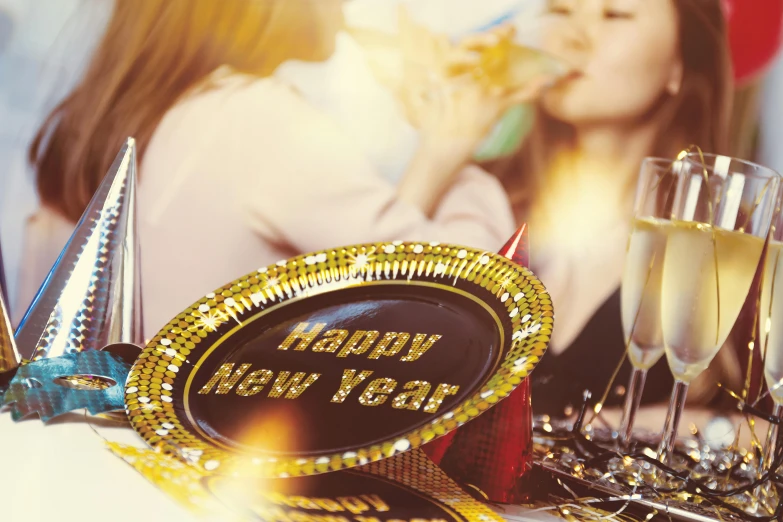 two women drinking champagne at a new year's eve party, a picture, by Adam Marczyński, shutterstock, on a plate in a busy diner, golden hour closeup photo, ilustration, high resolution image