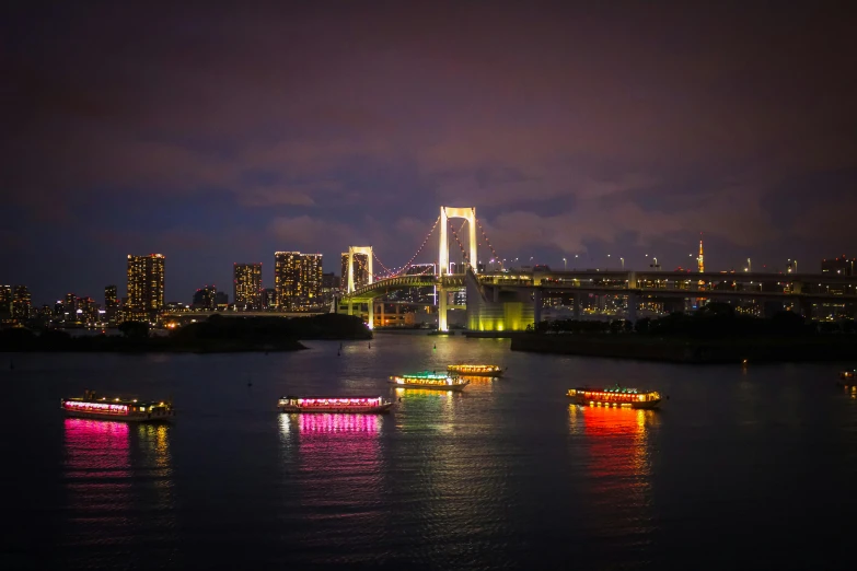 a group of boats floating on top of a body of water, pexels contest winner, sōsaku hanga, neon tokyo, 🚿🗝📝, colorful lighting, magic crystal bridge colorfully