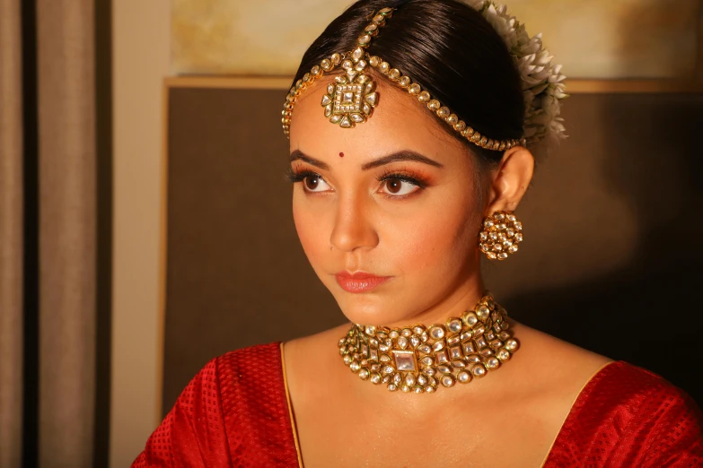 a woman in a red dress posing for a picture, inspired by Saurabh Jethani, renaissance, wearing gold detailed choker, thumbnail, silver jewellery, makeup