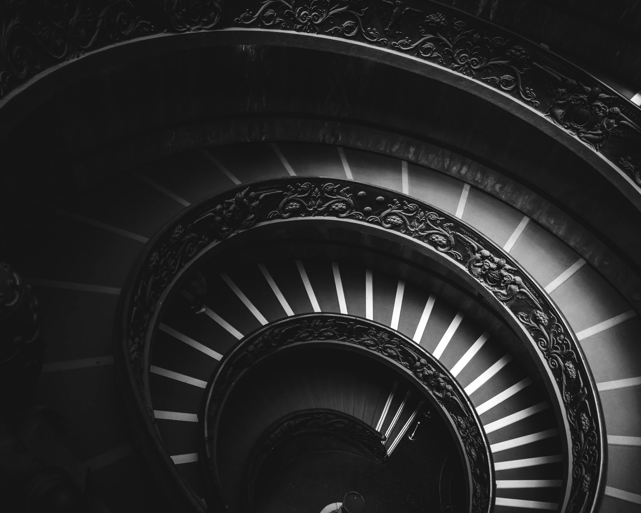 a black and white photo of a spiral staircase, by Kristian Zahrtmann, unsplash contest winner, baroque, all roads lead to rome, intricate detailed 8 k, leonardo da vinci), circles