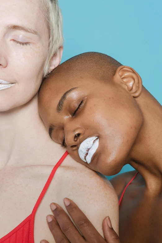 a woman brushing her teeth with a toothbrush, inspired by Ren Hang, antipodeans, woman holding another woman, short white hair shaved sides, profile image, diverse