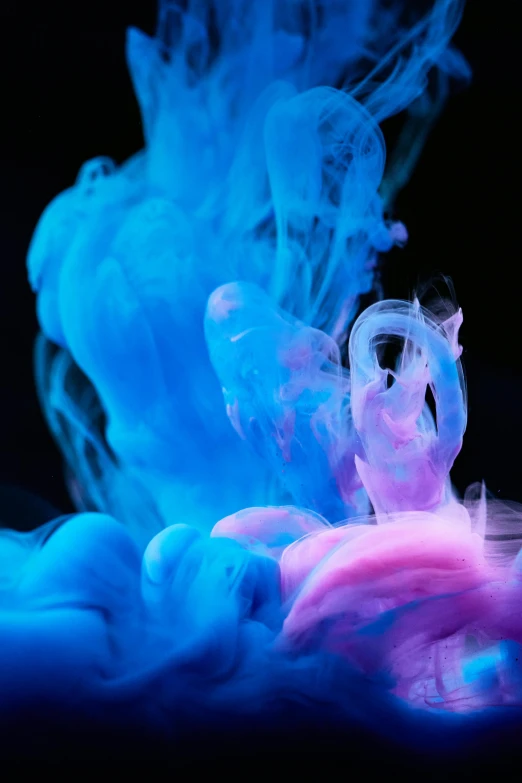 blue and pink ink in water on a black background, inspired by Kim Keever, pexels contest winner, made of cotton candy, color image, made of liquid, teamlab
