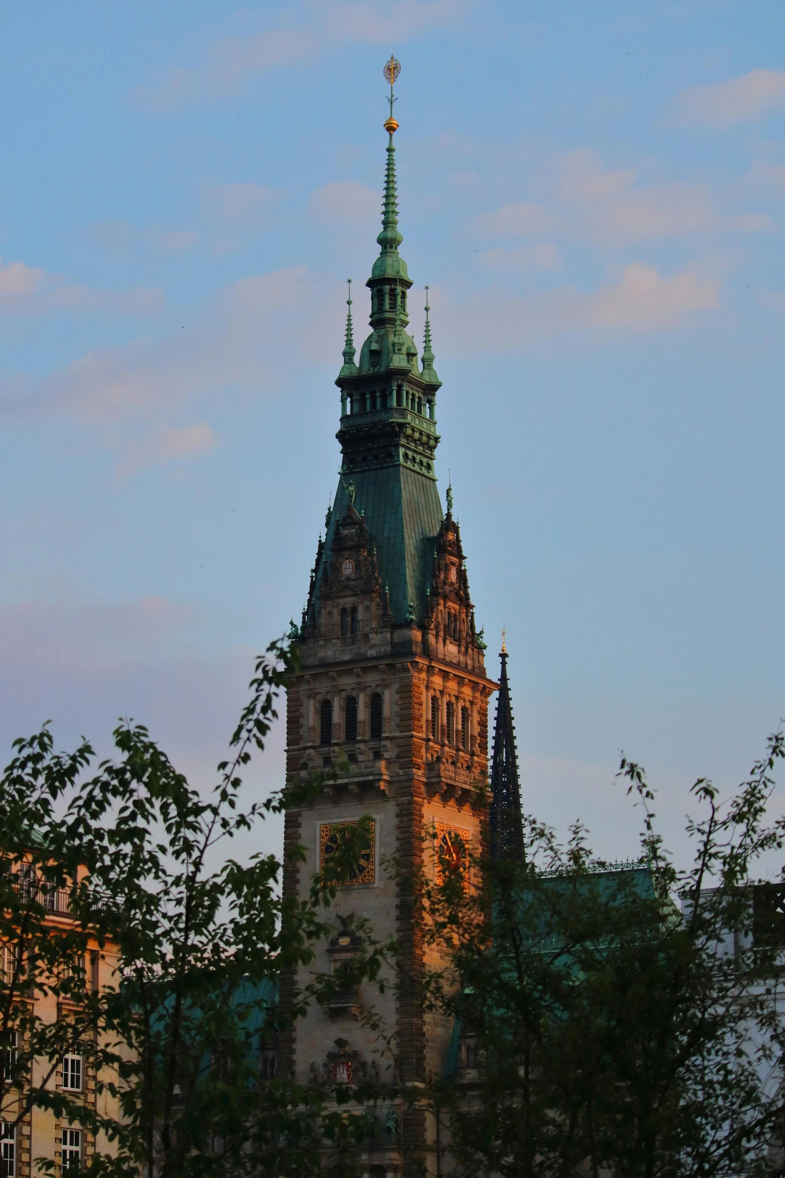 a tall tower with a clock on top of it, inspired by Stanisław Masłowski, early evening, spire, dome, hans