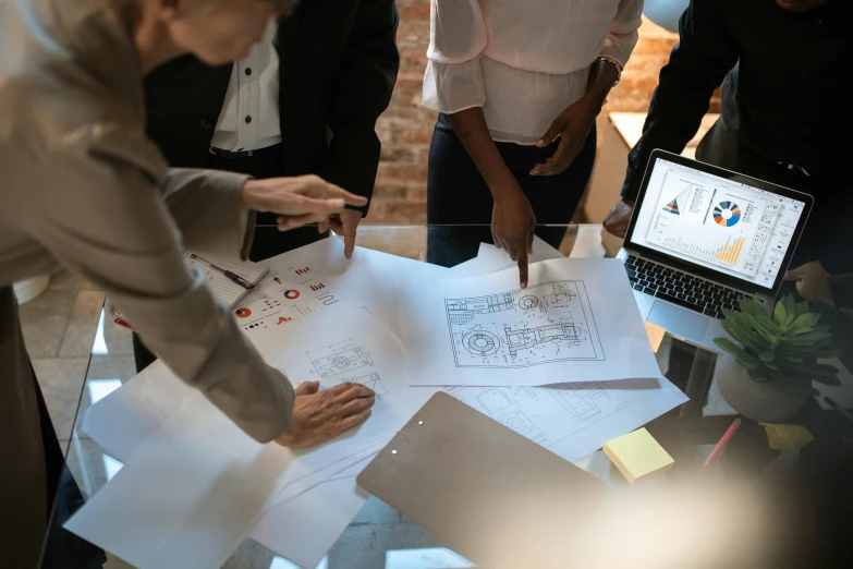 a group of people standing around a glass table, schematic in a notebook, professional modeling, thumbnail, inspect in inventory image