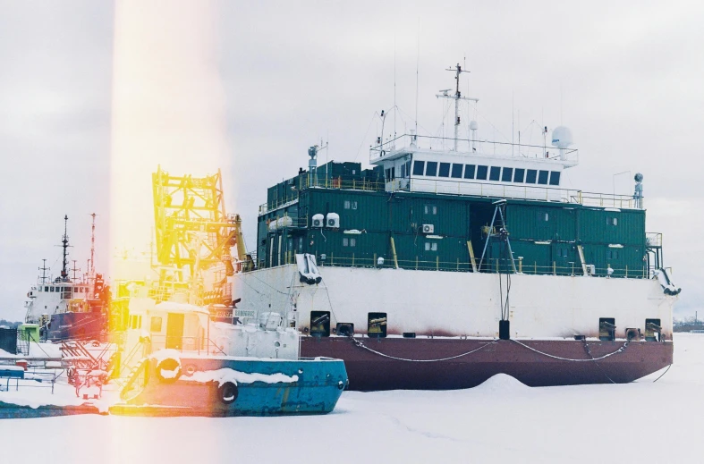 a boat that is sitting in the snow, an album cover, by Sven Erixson, pexels contest winner, hurufiyya, shipyard, refrigerated storage facility, fujicolor superia photo, borealis