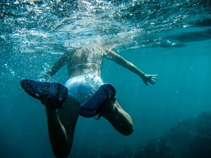 a man swimming under the surface of the water, by Jessie Algie, happening, manly, thighs, ocean dept, seapunk