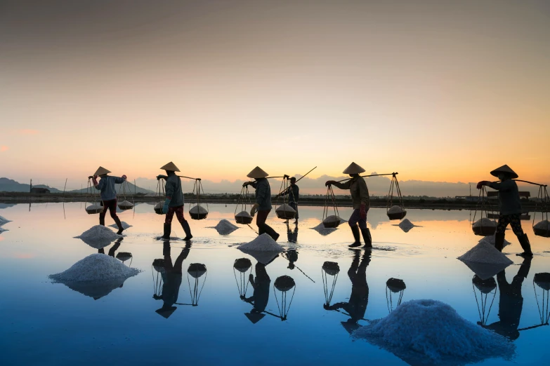 a group of people standing on top of a body of water, inspired by Steve McCurry, unsplash contest winner, fishing village, farming, glossy reflections, avatar image