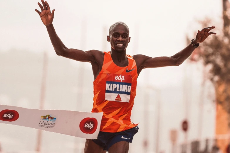 a man crosses the finish line of a marathon, by Matija Jama, pexels contest winner, brown skin man with a giant grin, 2 5 6 x 2 5 6 pixels, thomas kinkad, podium