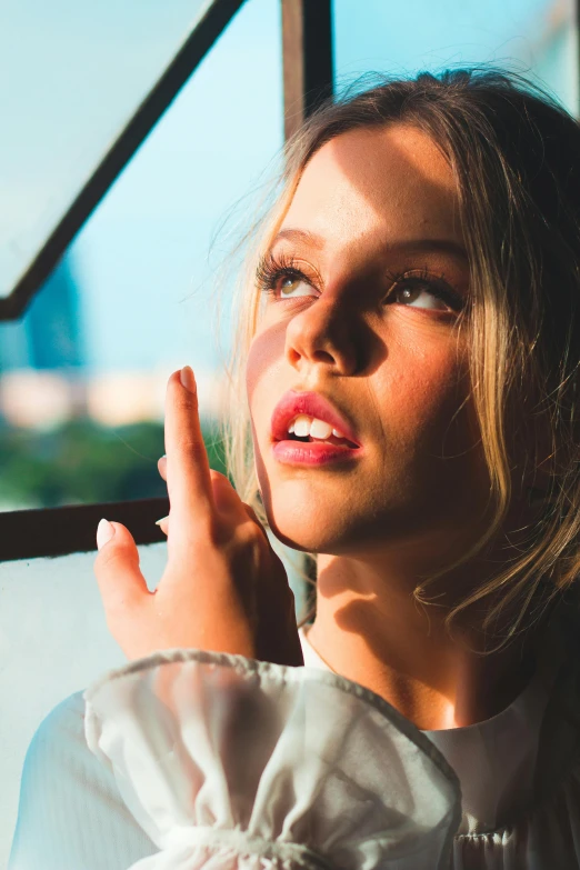 a close up of a person near a window, sexy lips :5 stylish, looking at the sky, 5 0 0 px models, teenage girl