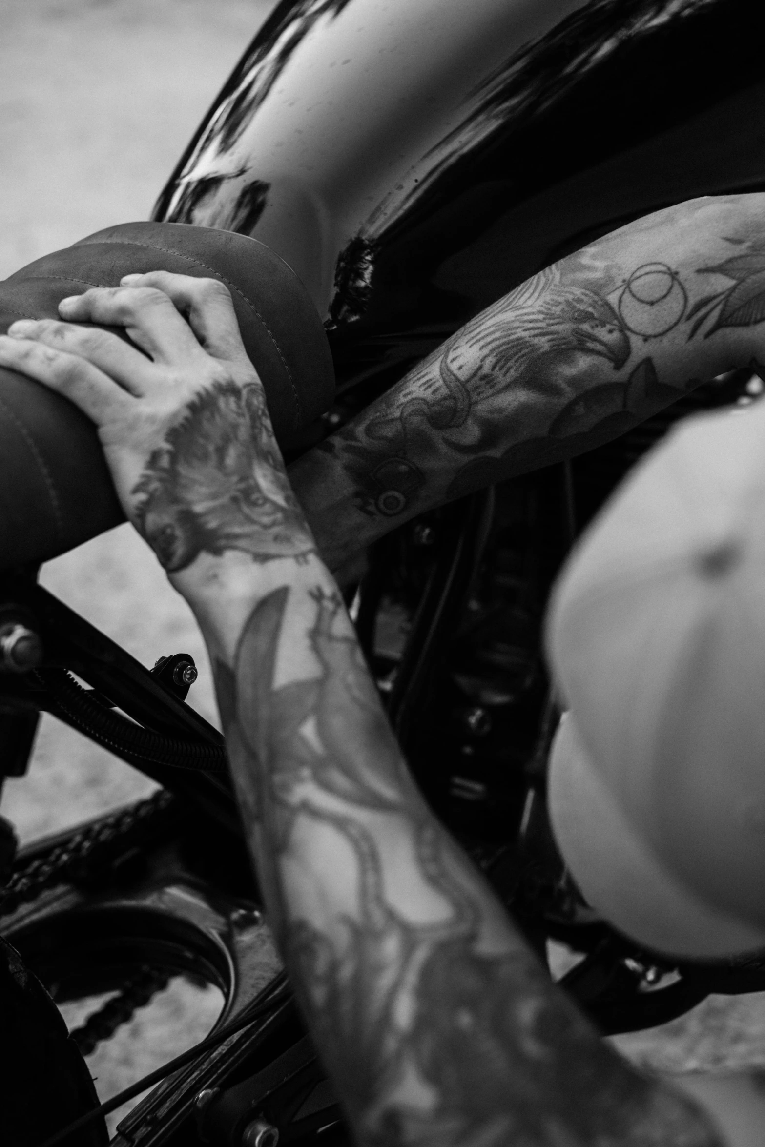 a black and white photo of a person on a motorcycle, a tattoo, unsplash, photorealism, holding each other hands, full colour, late morning, close ups