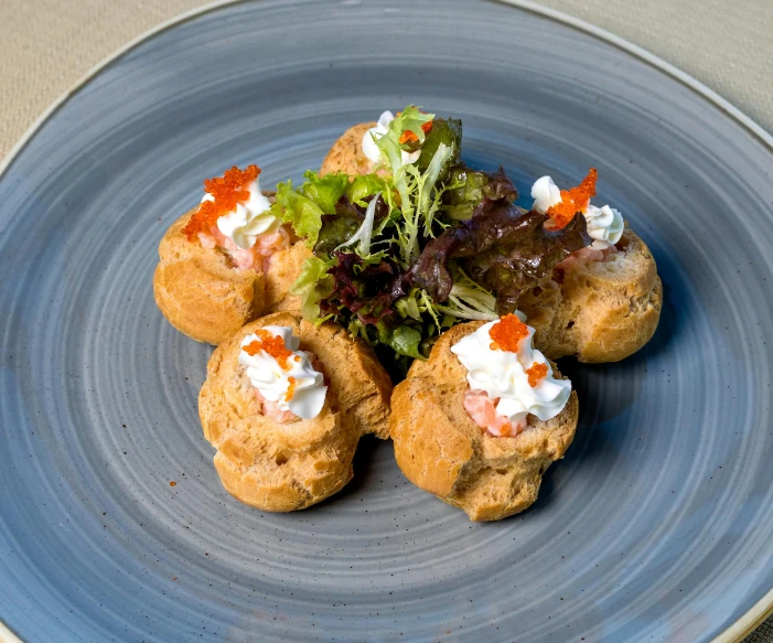 a close up of a plate of food on a table, white and orange, laputa, puffy, 6 pack