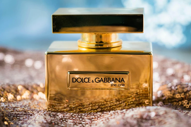 a close up of a bottle of perfume, dolce & gabbana campaign, gold plated, extra greasy, rectangle