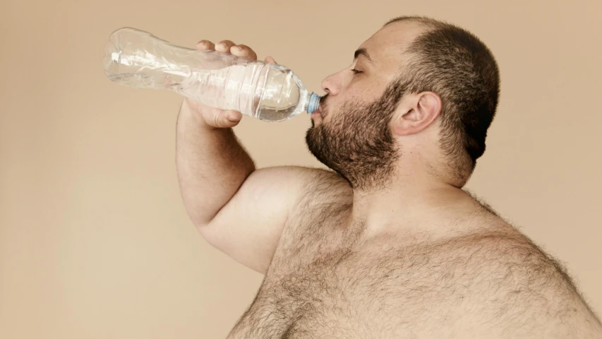 a man drinking water from a plastic bottle, pexels contest winner, hyperrealism, very hairy bodies, dad bod, plain background, double chin