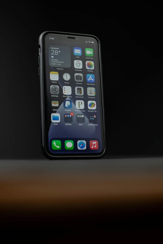 an iphone sitting on top of a table, a hologram, pexels, photorealism, corporate phone app icon, 4k], iphone 13, black on black