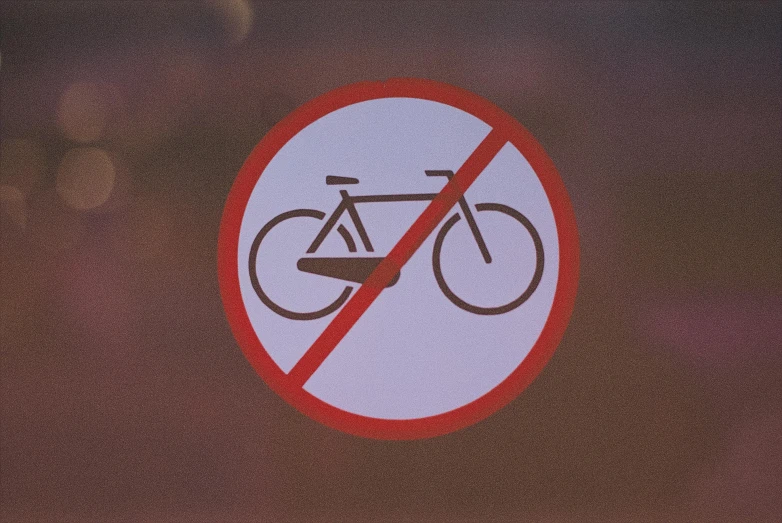 a close up of a sign with a bike in it, a poster, unsplash, plasticien, forbidden, no - text no - logo, avatar image, brown