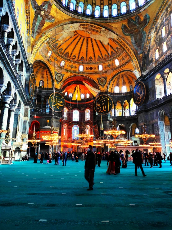 a group of people that are inside of a building, a mosaic, inspired by Osman Hamdi Bey, pexels contest winner, with great domes and arches, bird\'s eye view, inside cathedral, turquoise and venetian red