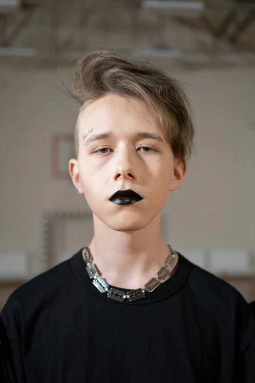 a boy with a fake mustache on his face, an album cover, inspired by Nikolaj Abraham Abildgaard, reddit, black lipstick, high quality photo, choker, portrait of jerma985