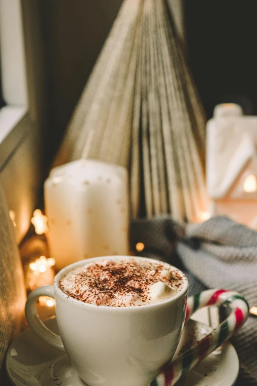 a cup of coffee sitting on top of a saucer, holiday vibe, ivory and copper, thumbnail, hot cocoa drink