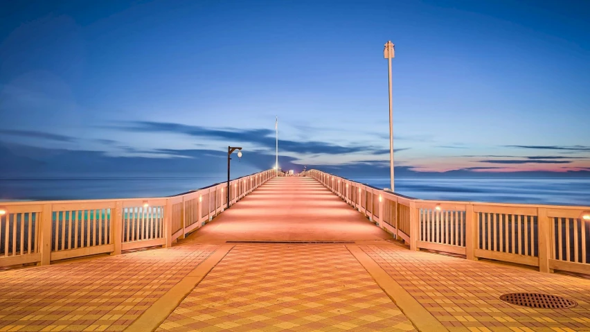 a wooden bridge over a body of water, by Carey Morris, unsplash contest winner, vibrant lights, oceanside, checkerboard horizon, 2 5 6 x 2 5 6 pixels