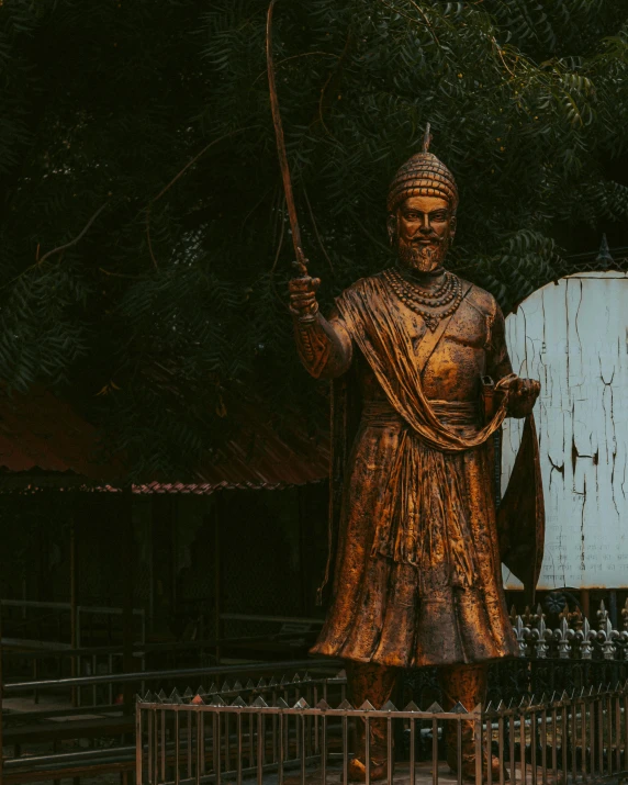 a statue of a man holding a sword, a statue, pexels contest winner, of indian princess, 🚿🗝📝