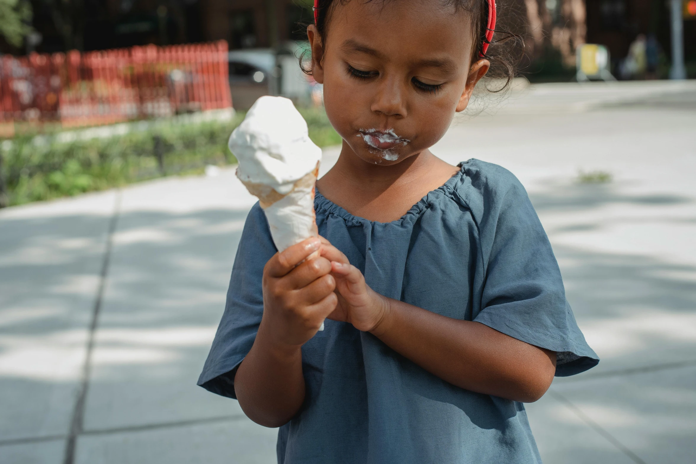 a little girl eating an ice cream cone, pexels contest winner, white, thumbnail, 15081959 21121991 01012000 4k, inuit