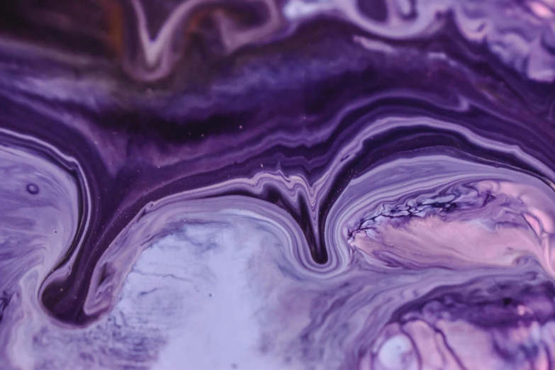a close up of a liquid substance on a surface, trending on pexels, abstract expressionism, purple alien, agate, album, from arcane